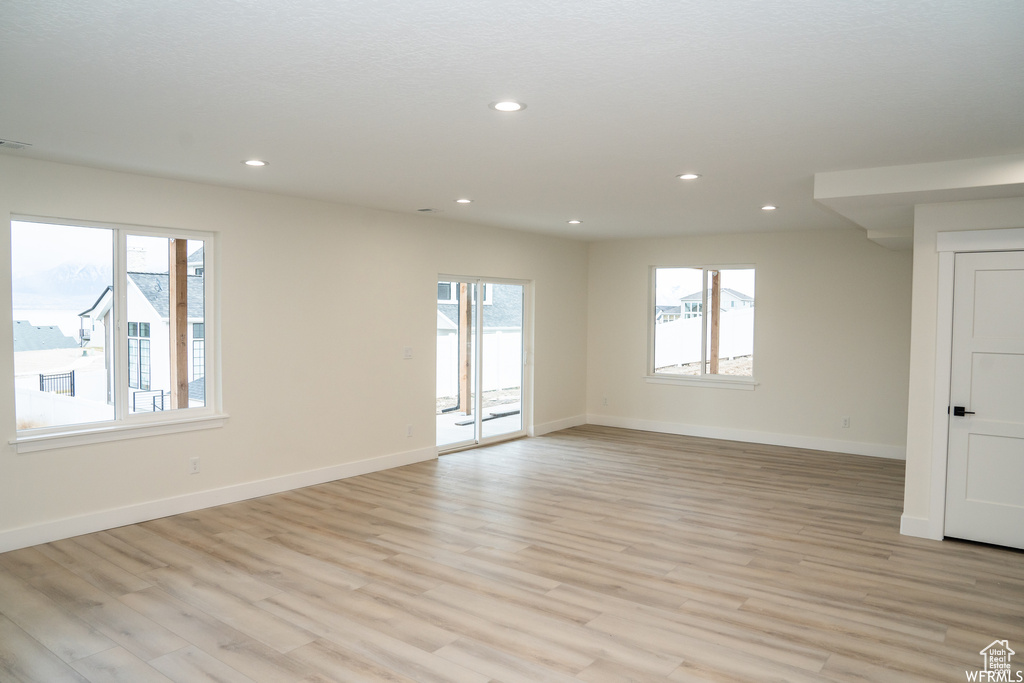 Empty room featuring light hardwood / wood-style floors