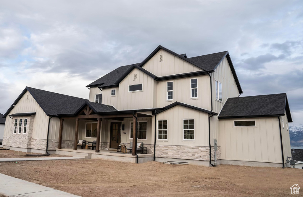 Modern farmhouse style home featuring covered porch