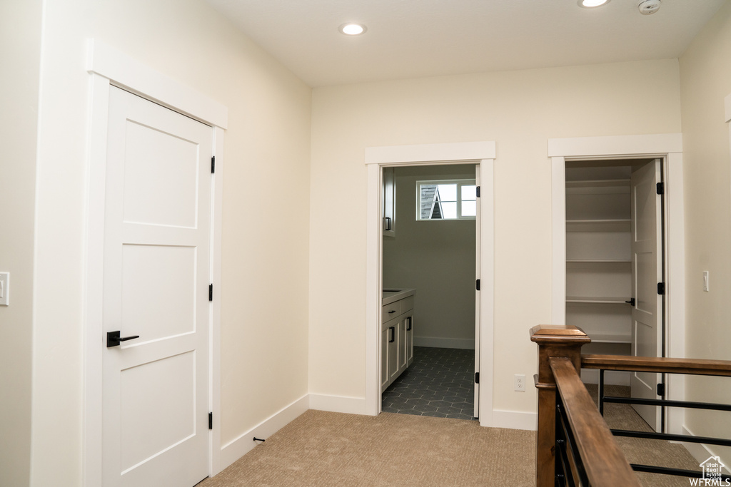 Corridor with carpet floors