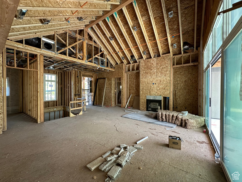 Misc room with a towering ceiling
