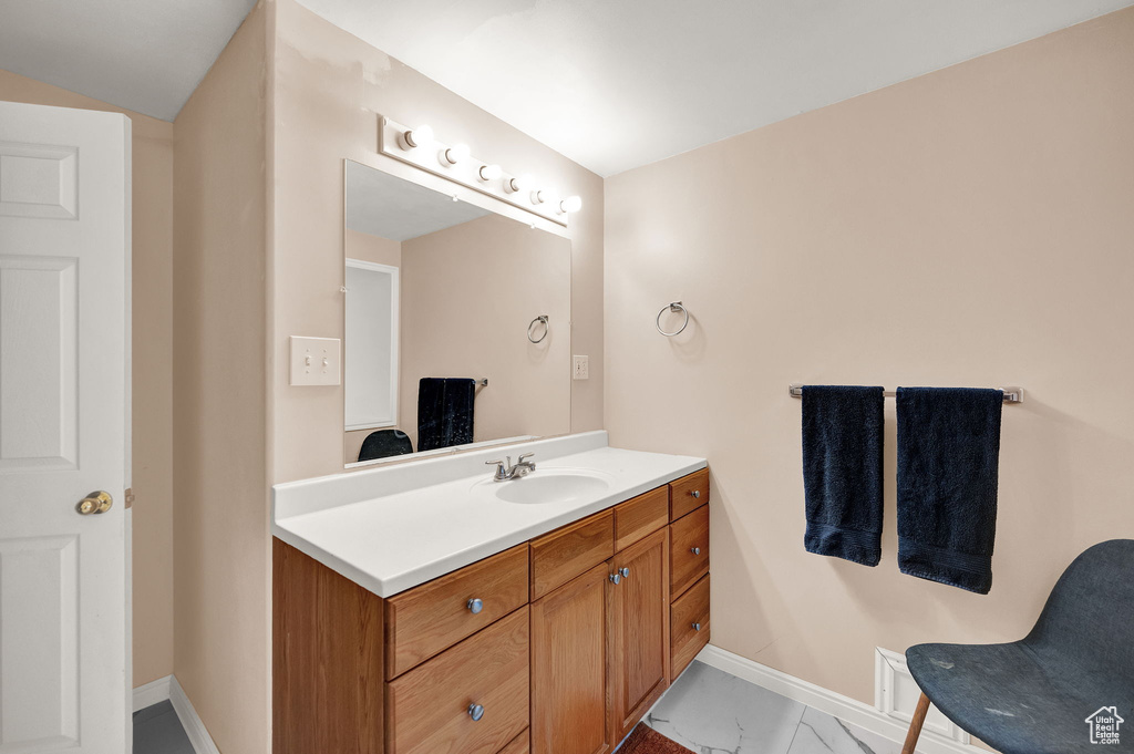 Bathroom with tile floors and vanity