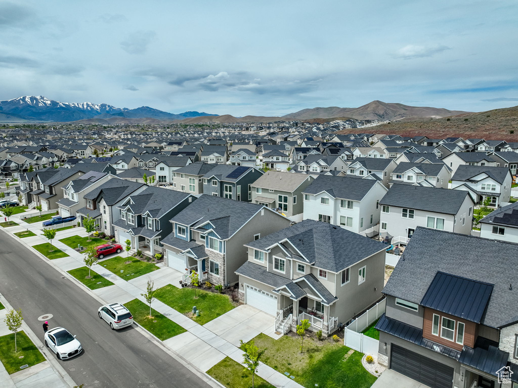 Birds eye view of property with a mountain view