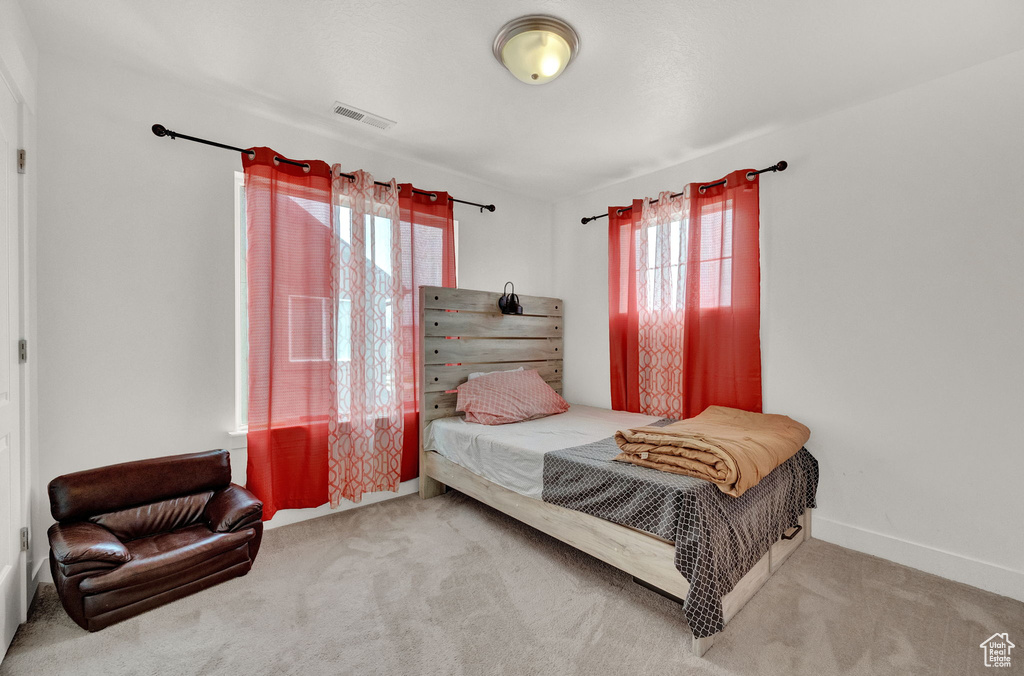 Bedroom featuring carpet flooring