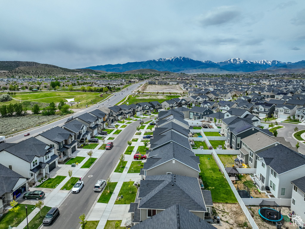 Birds eye view of property with a mountain view