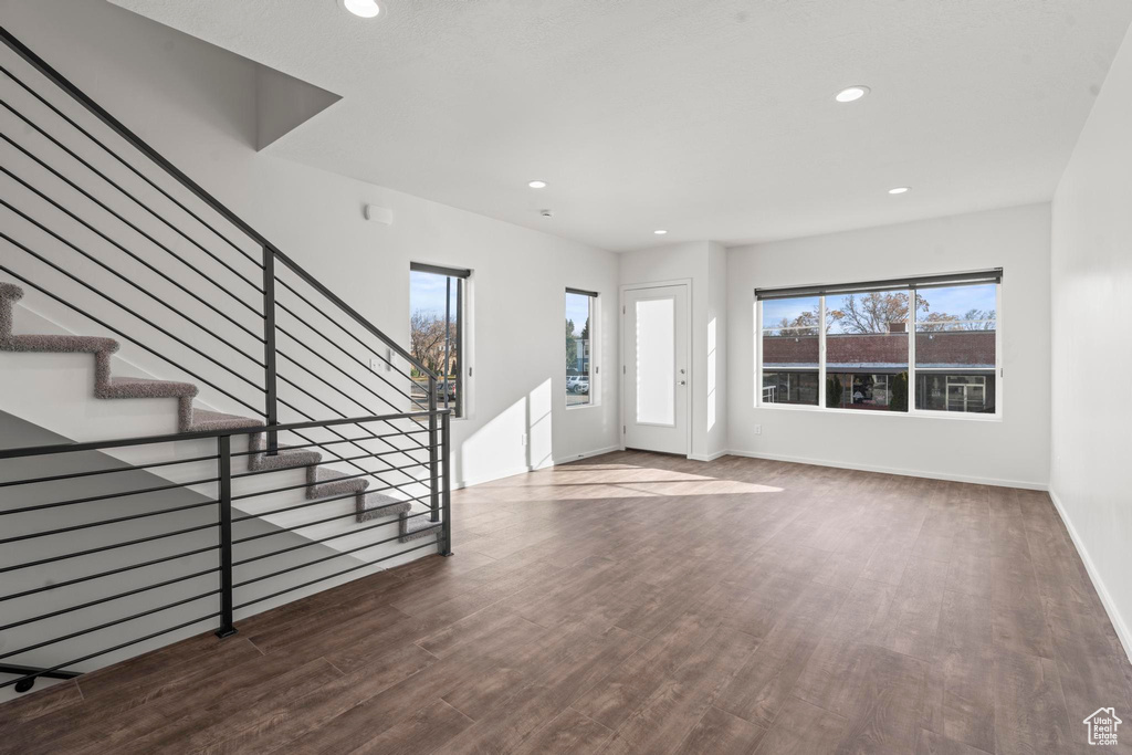 Entrance foyer with dark wood-type flooring