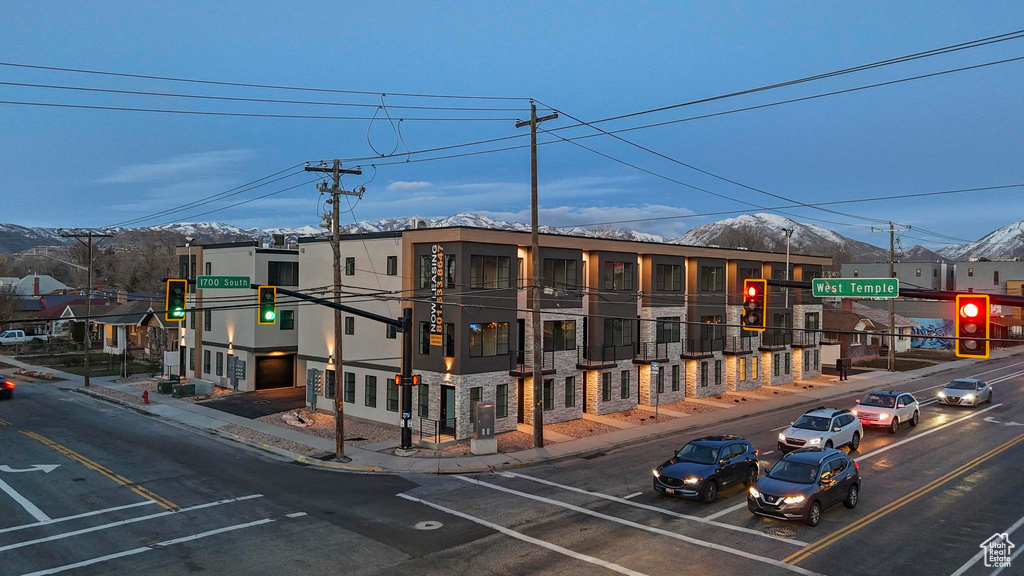 View of building exterior featuring a mountain view