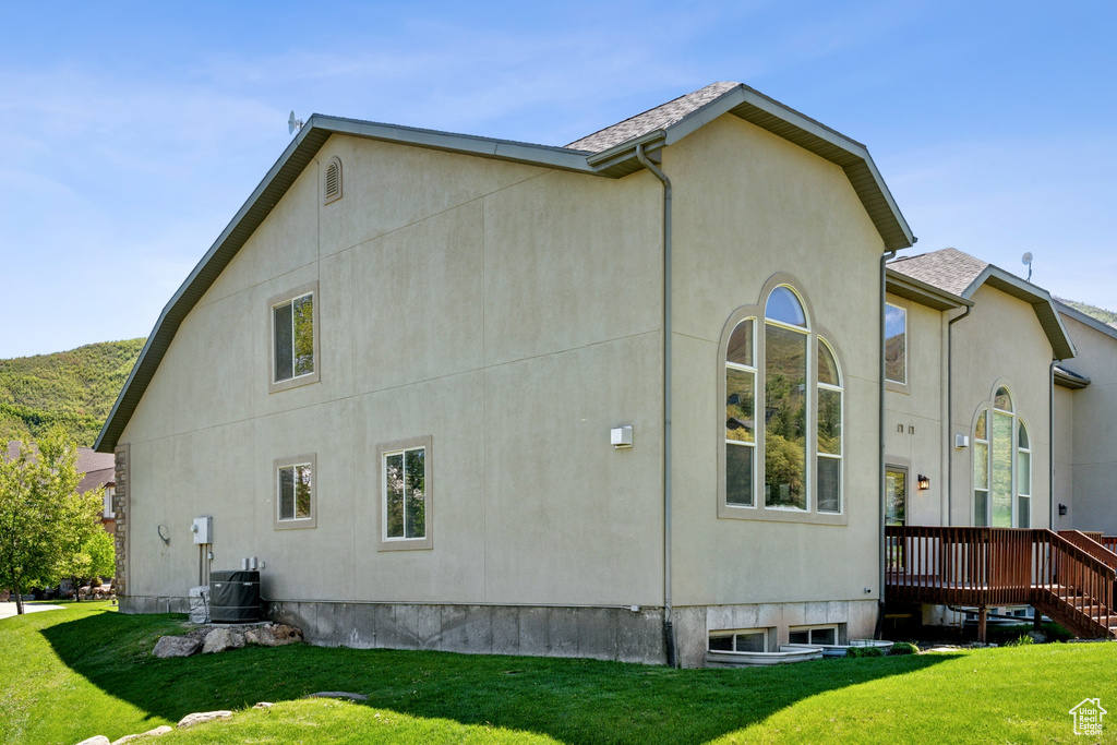 View of home's exterior featuring a yard