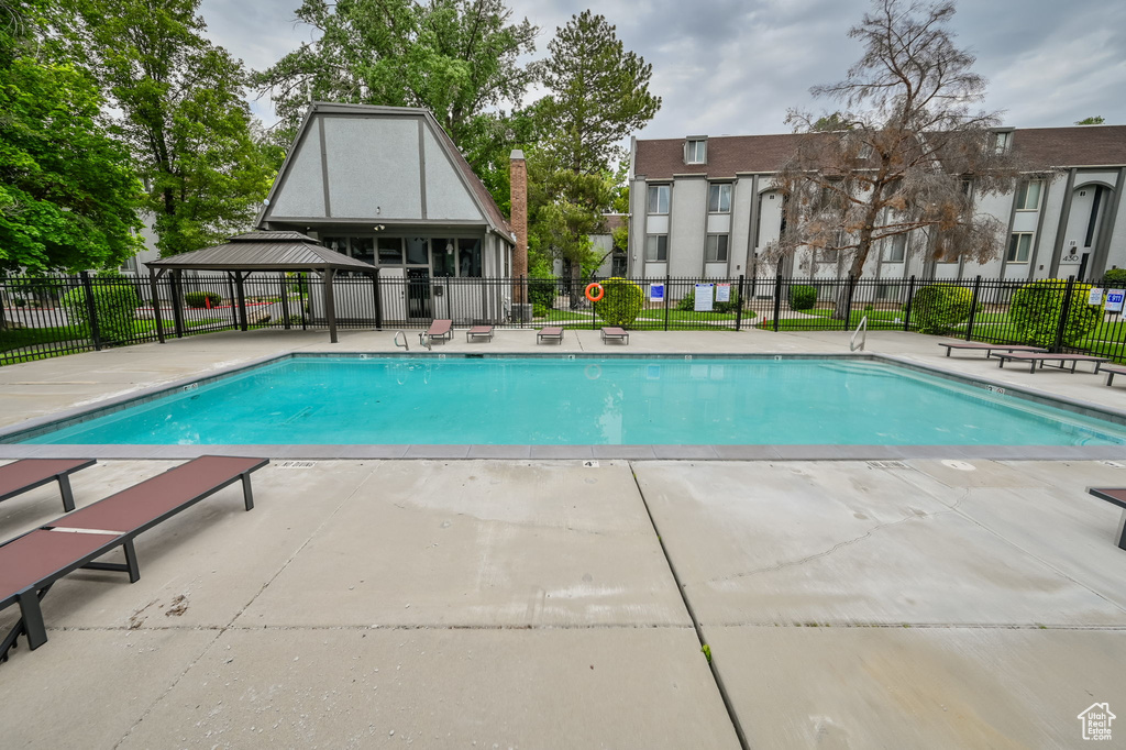 View of swimming pool featuring a gazebo