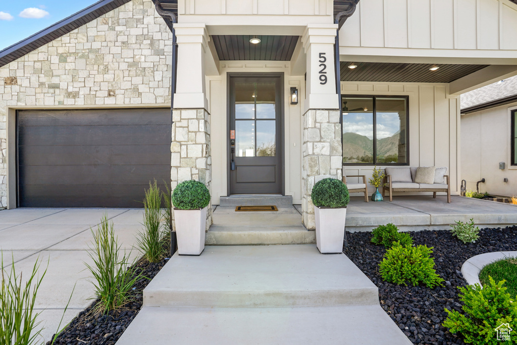 Entrance to property with a garage