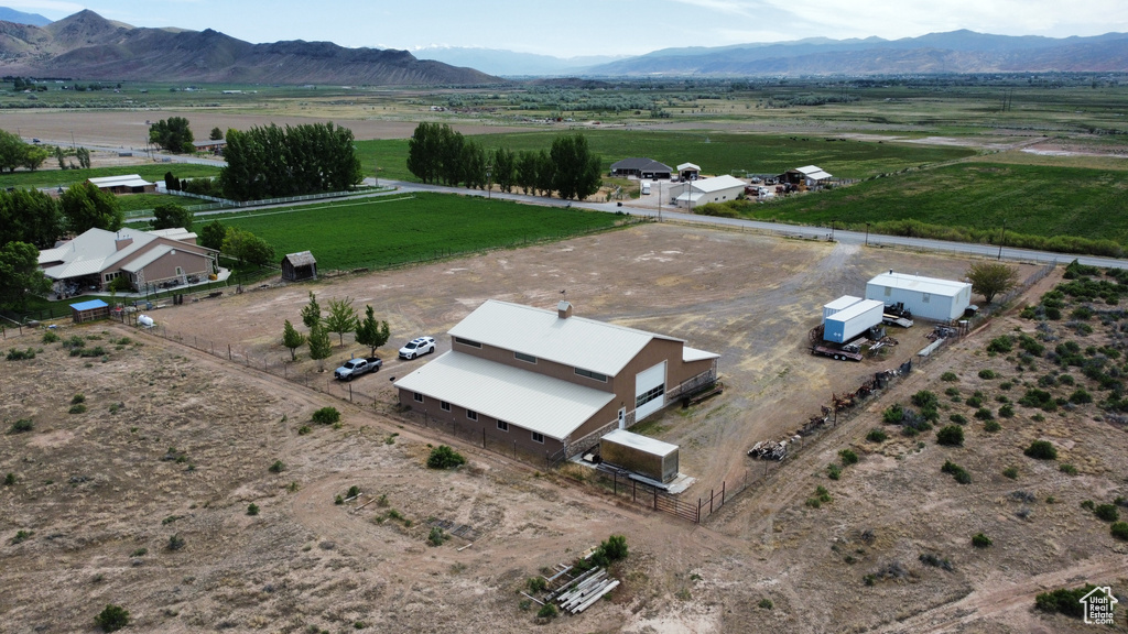 Birds eye view of property featuring a rural view and a mountain view