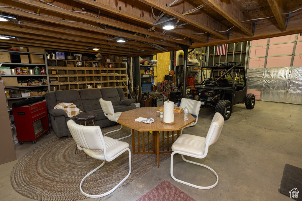 Dining space featuring concrete floors