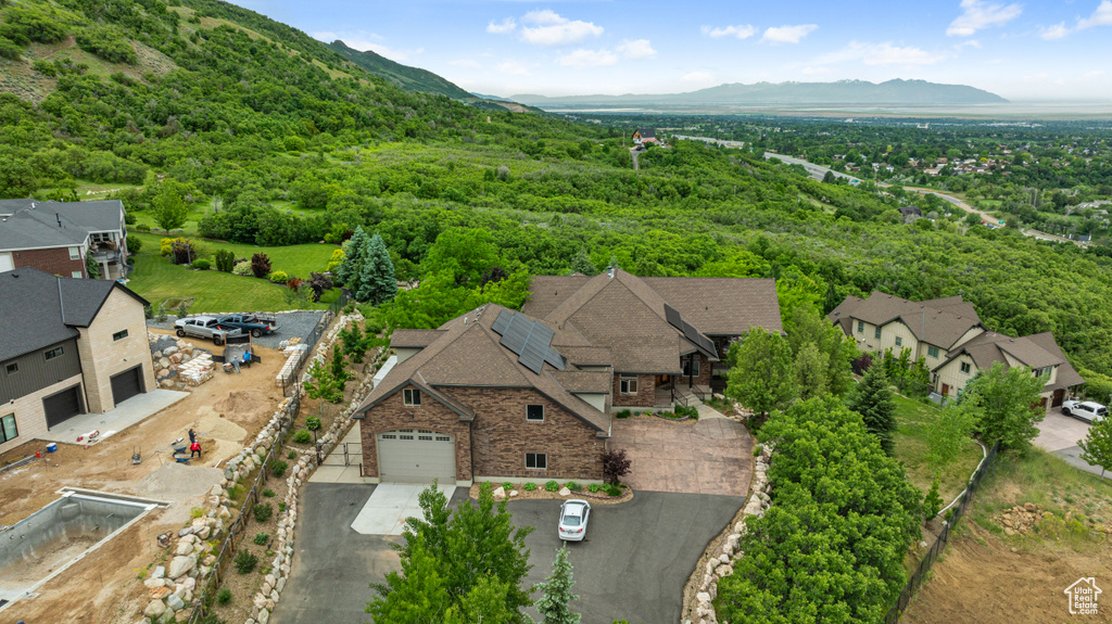 Birds eye view of property featuring a mountain view