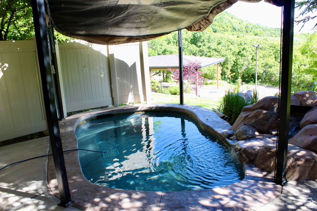 View of pool with a patio