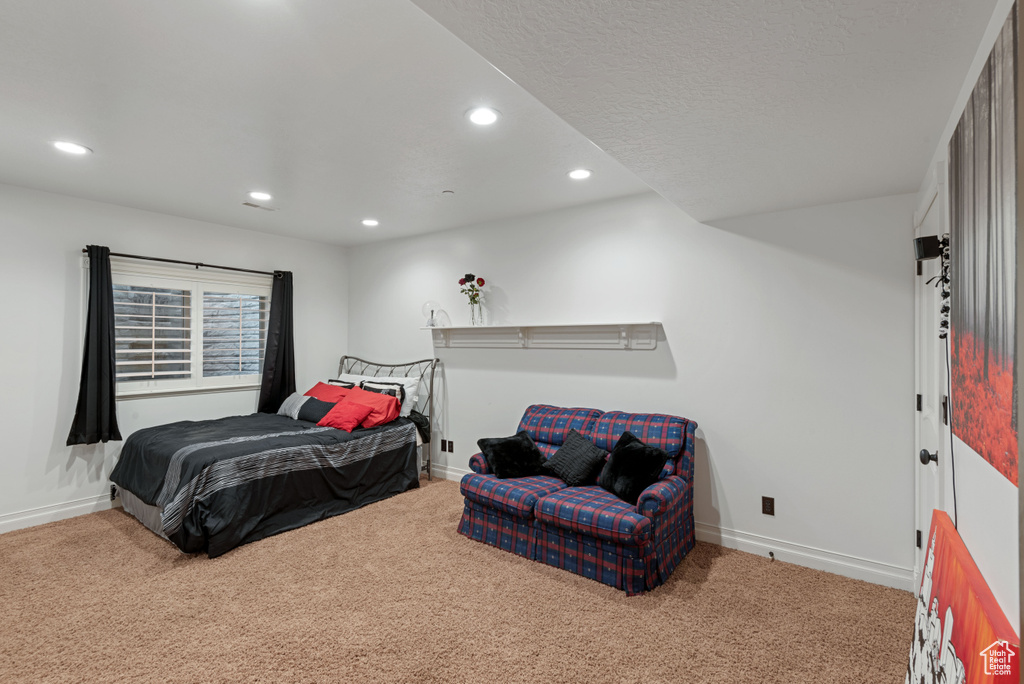 Bedroom with carpet