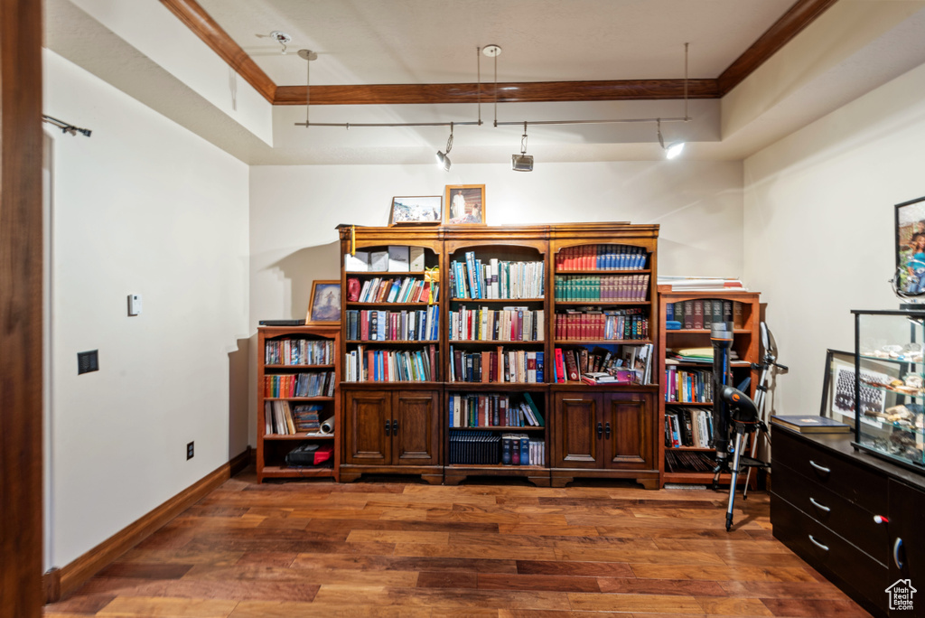 Sitting room featuring dark wood-type flooring