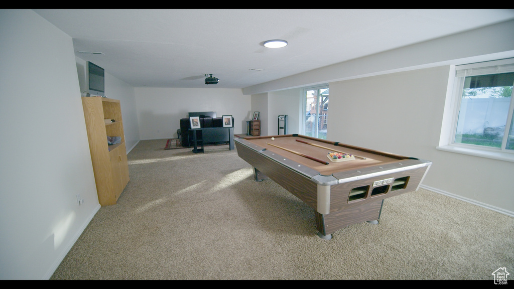 Game room featuring carpet and billiards