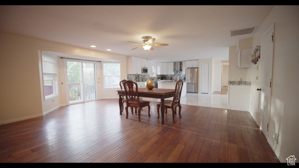 Dining space featuring light hardwood / wood-style floors and ceiling fan