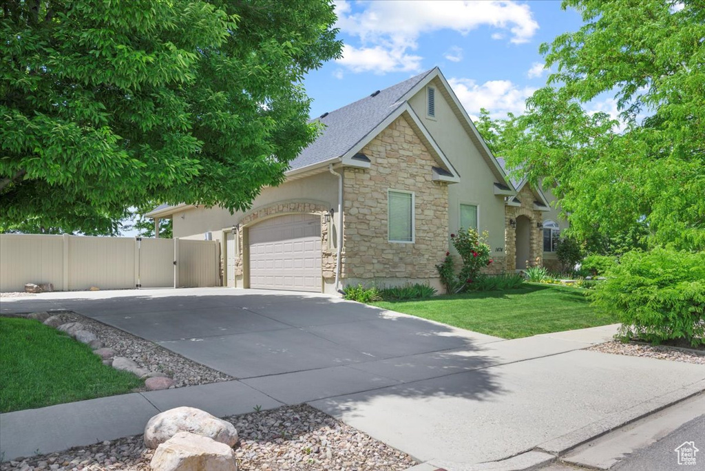 View of front of home featuring a garage