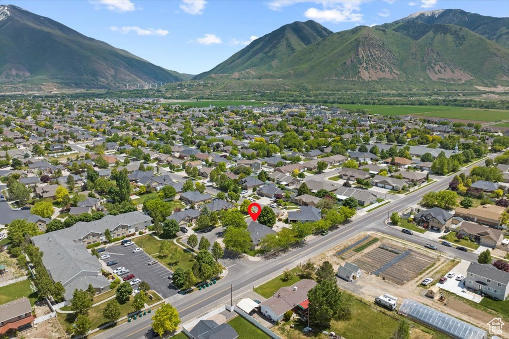 Birds eye view of property featuring a mountain view