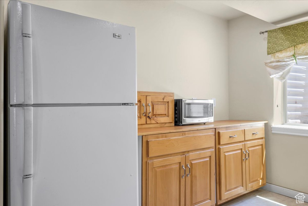 Kitchen with white refrigerator