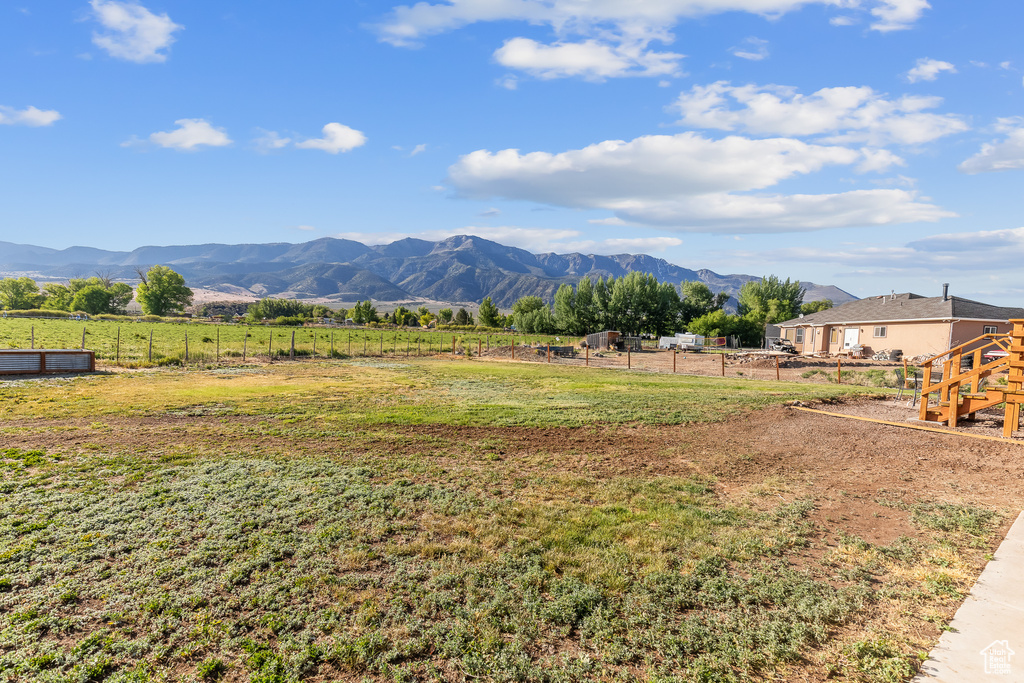 View of mountain feature with a rural view