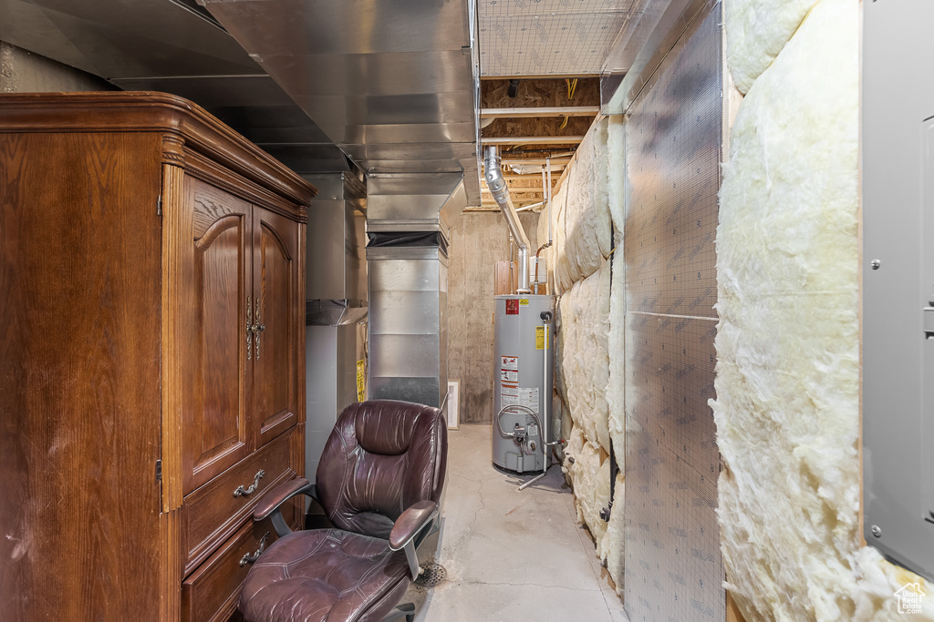 Basement featuring water heater