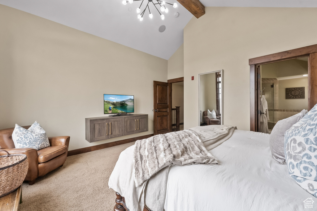 Carpeted bedroom with a notable chandelier, beam ceiling, and high vaulted ceiling