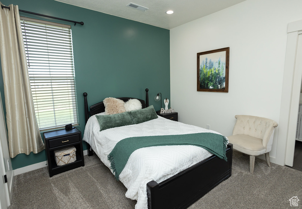 View of carpeted bedroom