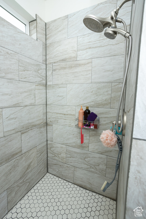 Bathroom with tiled shower