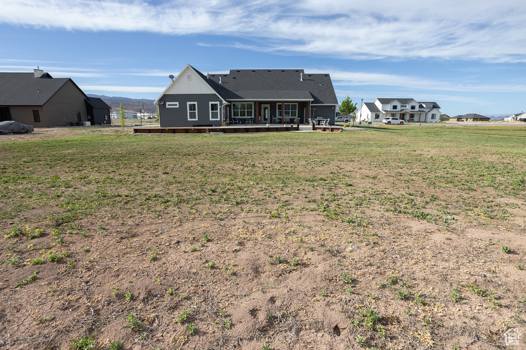 Exterior space featuring a lawn