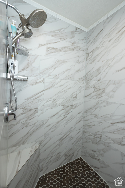 Bathroom with a tile shower