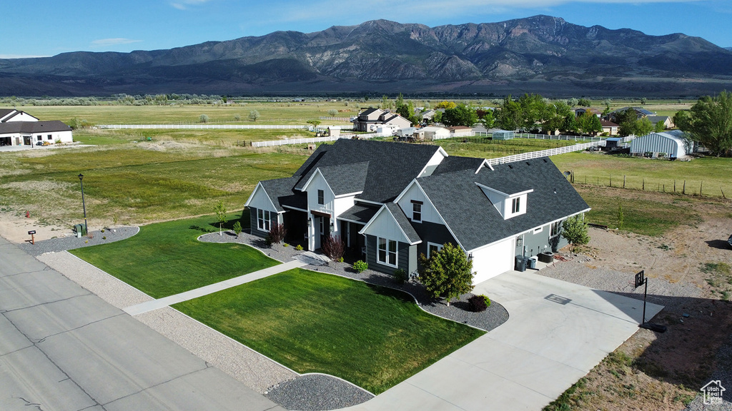 Birds eye view of property featuring a mountain view