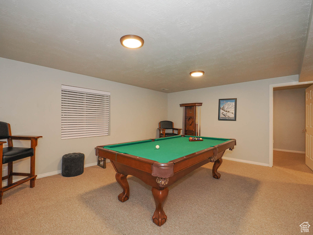 Playroom featuring pool table and carpet floors