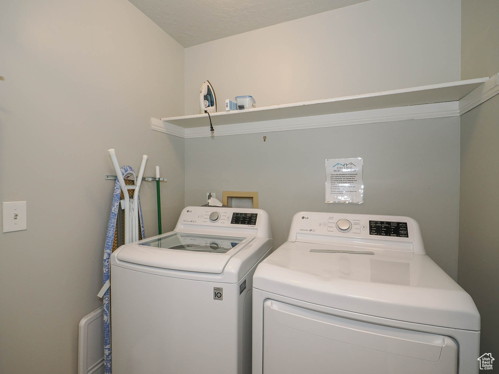 Laundry room with independent washer and dryer and hookup for a washing machine