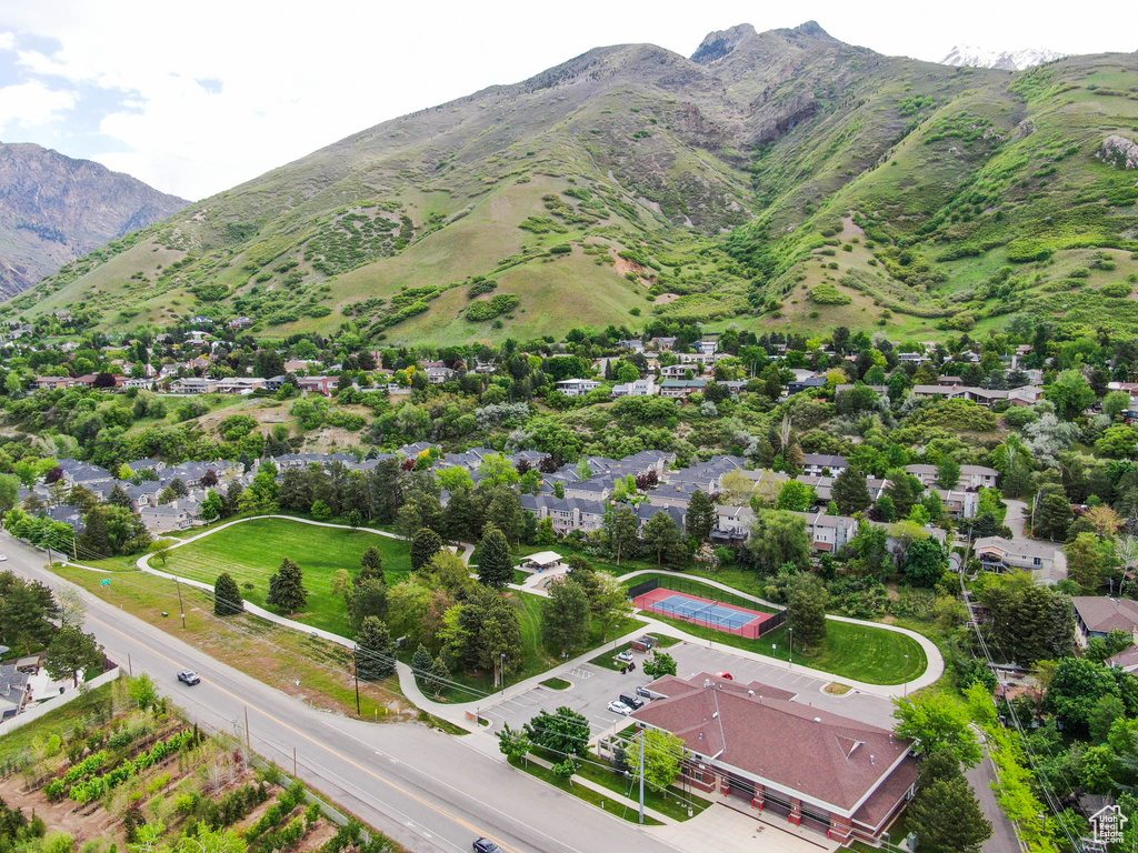 Birds eye view of property with a mountain view