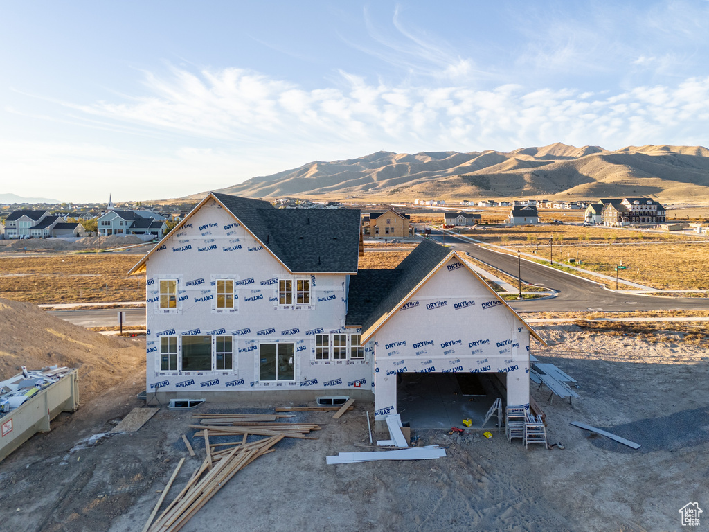 Exterior space featuring a mountain view