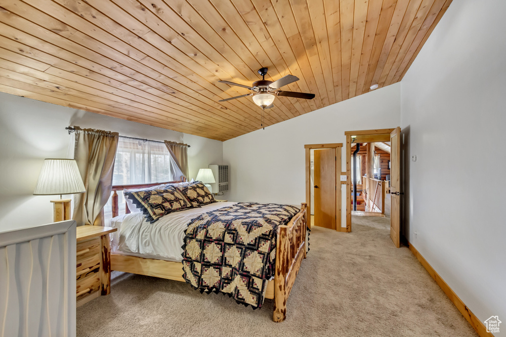 Carpeted bedroom with wooden ceiling, ceiling fan, and lofted ceiling