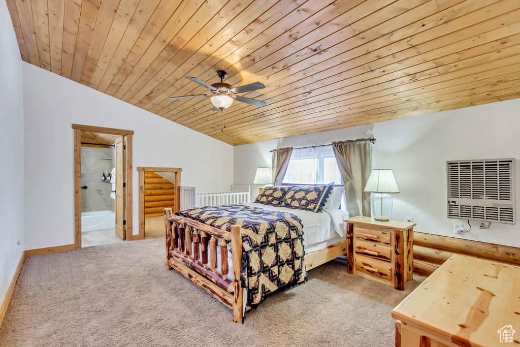 Carpeted bedroom featuring ensuite bath, wooden ceiling, ceiling fan, and lofted ceiling