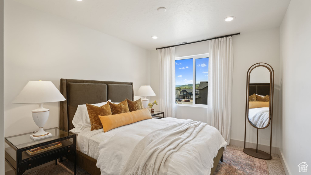 View of carpeted bedroom