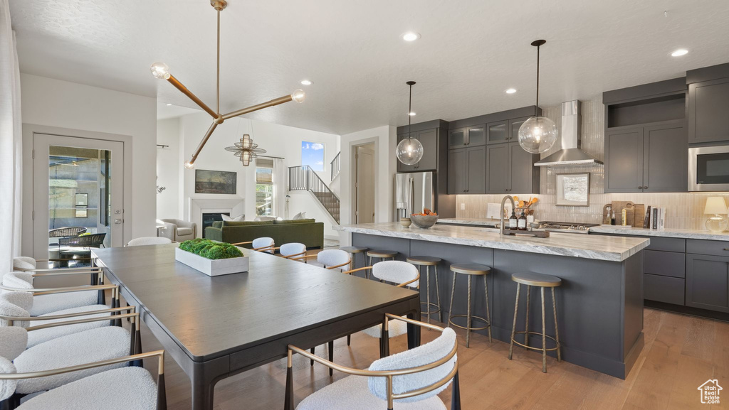 Dining room with light hardwood / wood-style floors