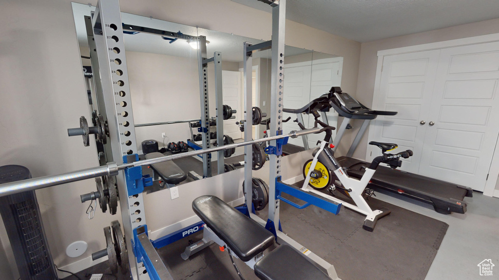 Exercise room with concrete floors