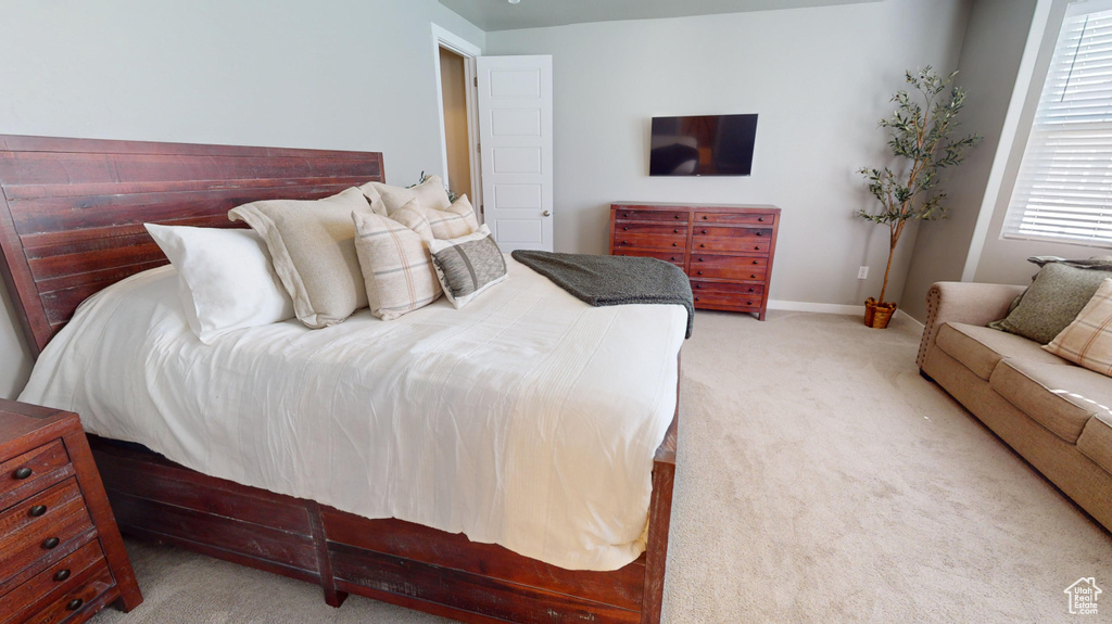 Bedroom with carpet flooring