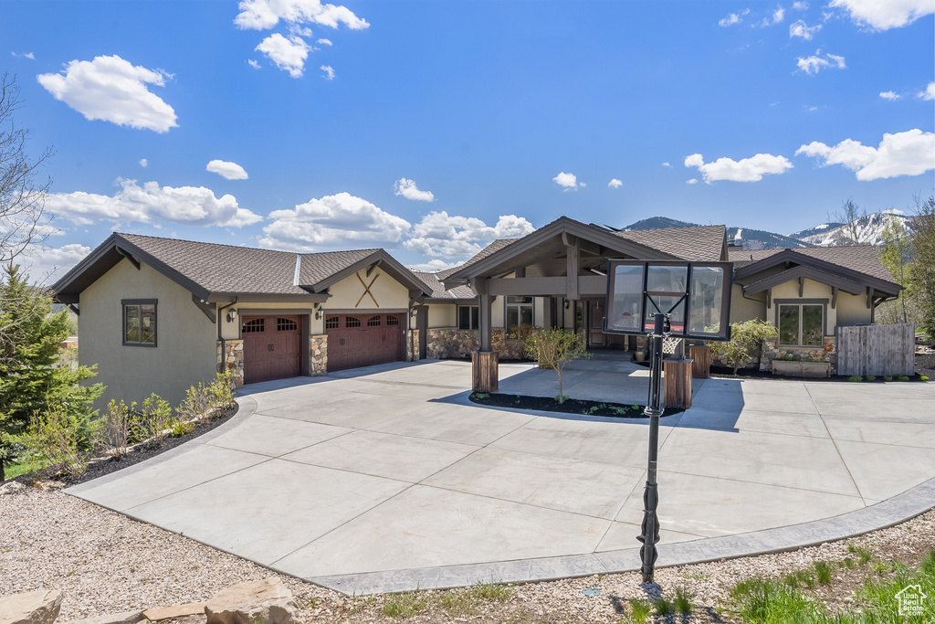 View of front of home featuring a garage