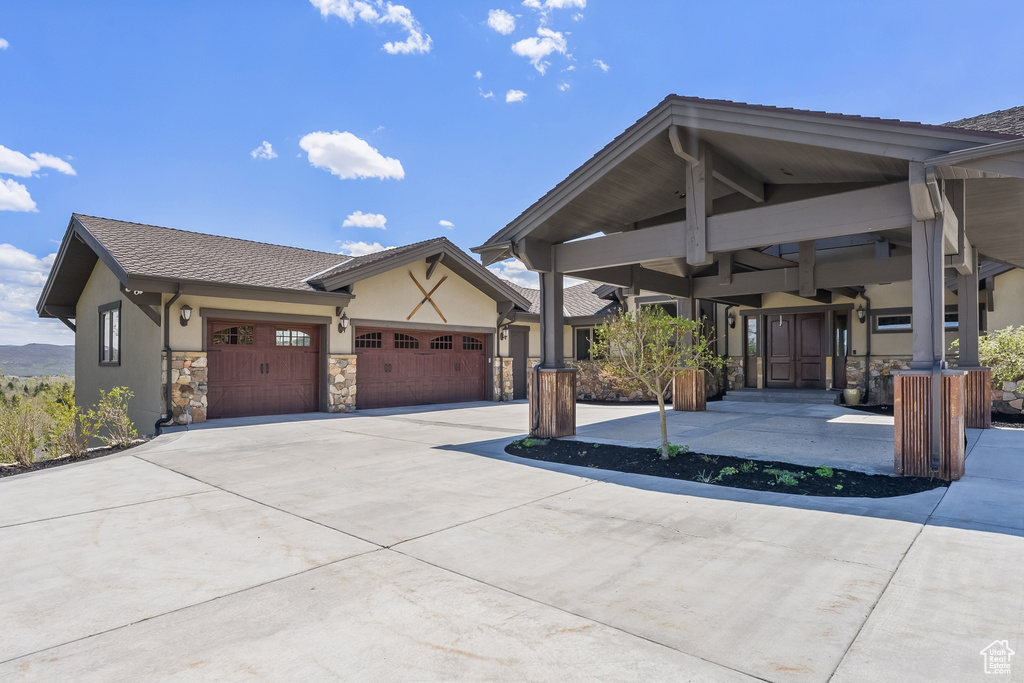 Craftsman-style home featuring a garage