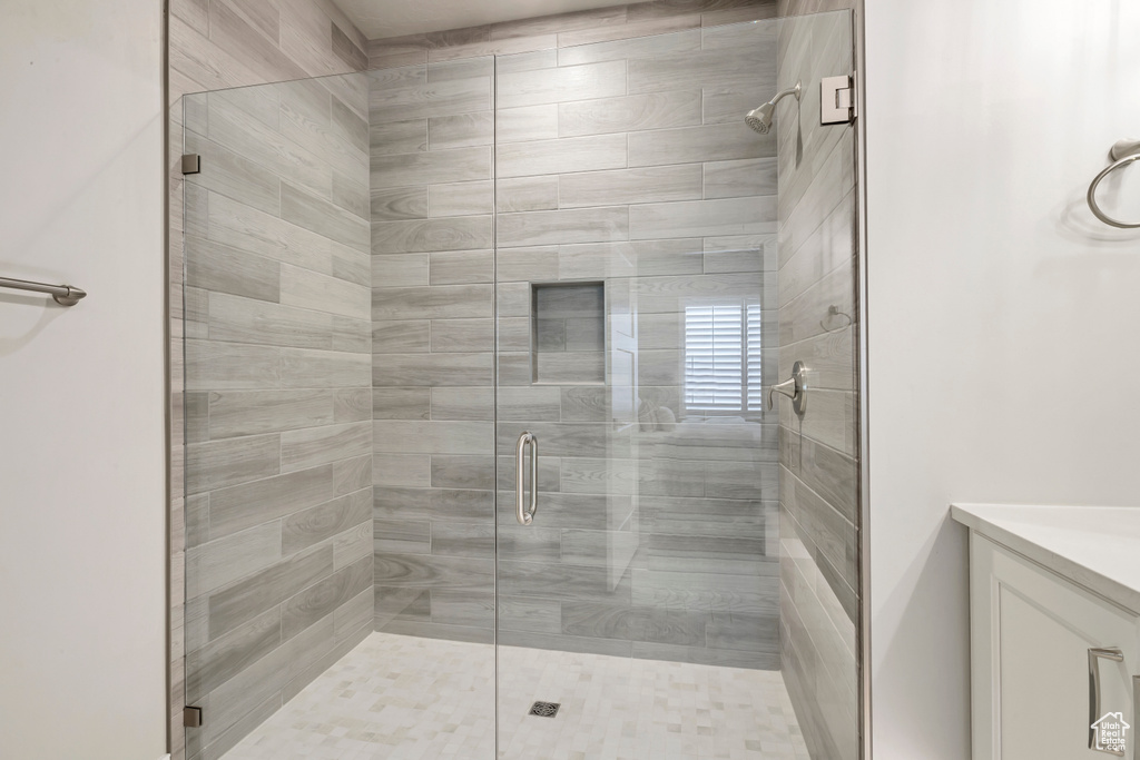 Bathroom with an enclosed shower