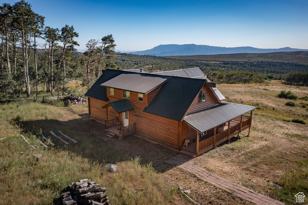 Birds eye view of property featuring a mountain view