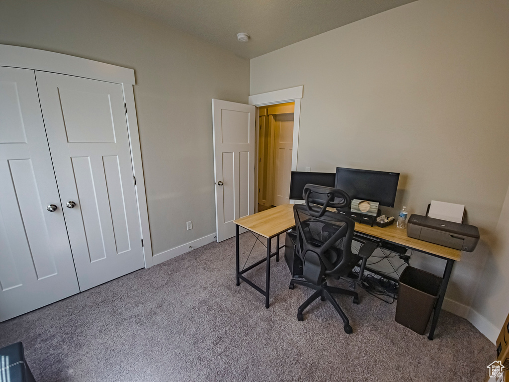 View of carpeted home office