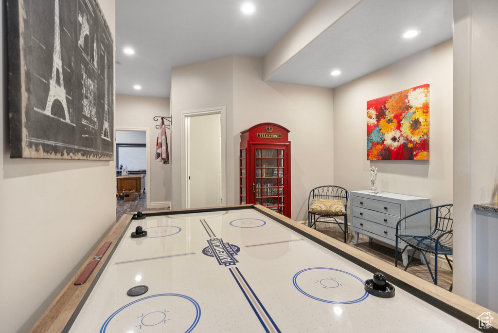 Game room featuring hardwood / wood-style flooring