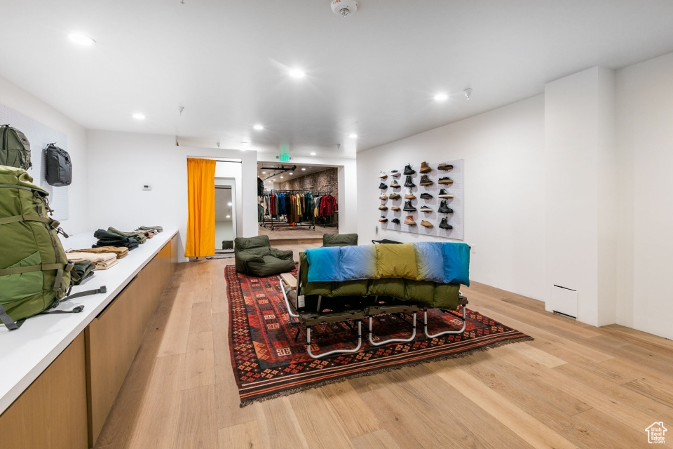 Living room with light hardwood / wood-style flooring