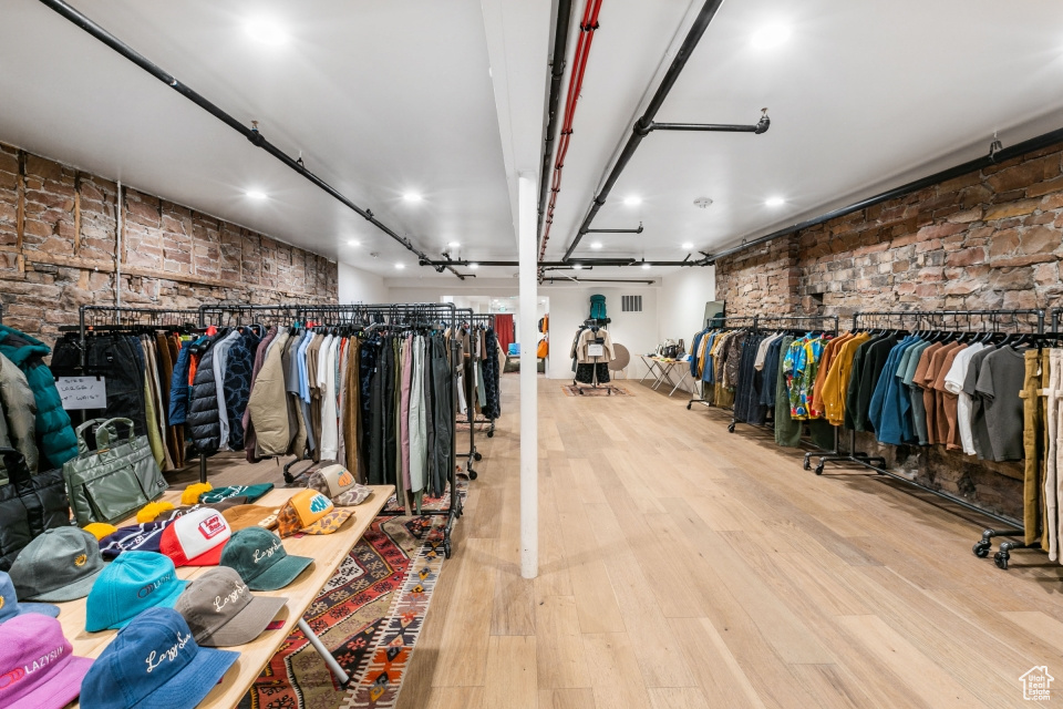 Walk in closet featuring light wood-type flooring